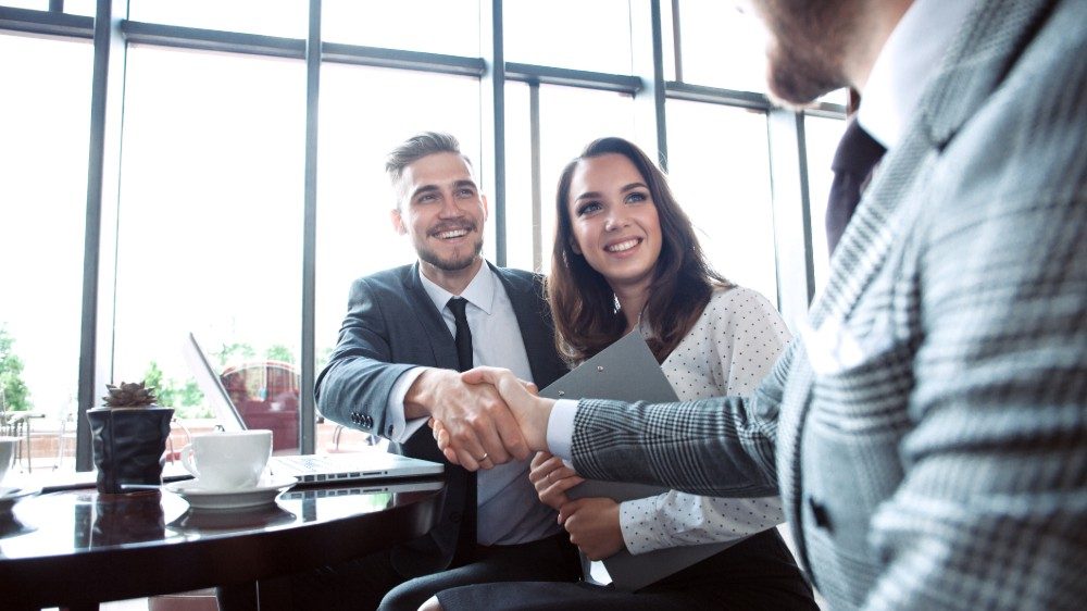 Business people shaking hands